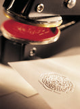 Papierprägepresse Justrite JLR inklusive Logogravur in Messing